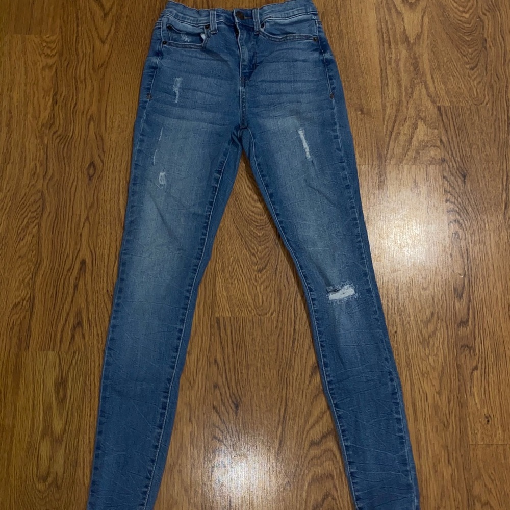 Blue Jeans with minimal ripped details